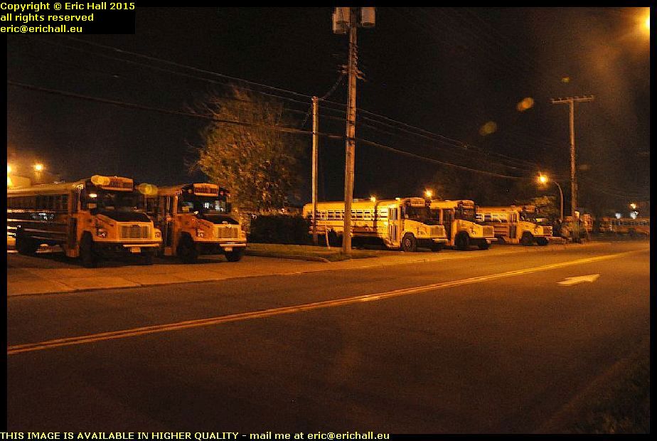 halifax nova scotia school buses parked up cote de liesse montreal quebec canada