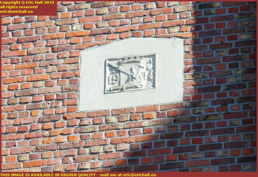 rebuilding world war 1 plaque architect tiensestraat leuven belgium
