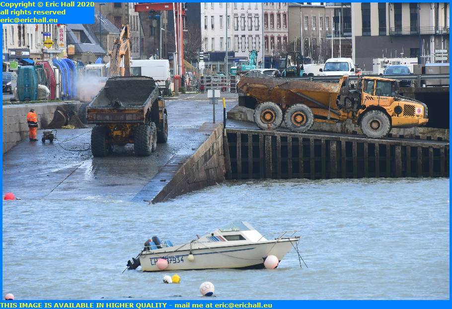 pressure washing heavy dumper lorries port de granville harbour manche normandy france eric hall