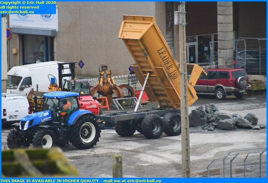 tractor trailer tipping concrete port de granville harbour manche normandy france eric hall