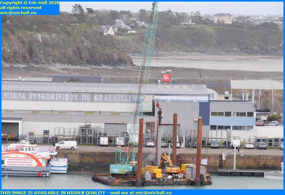 installing floating pontoon support pillar port de granville harbour manche normandy france eric hall