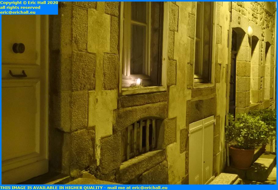 candle in window rue notre dame granville manche normandy france eric hall