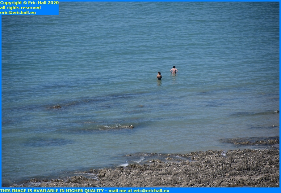 swimmers in sea plat gousset granville manche normandy france eric hall