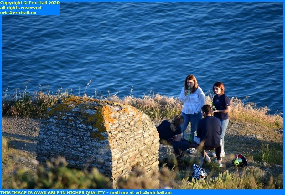 young people picnicking pointe du roc granville manche normandy france eric hall