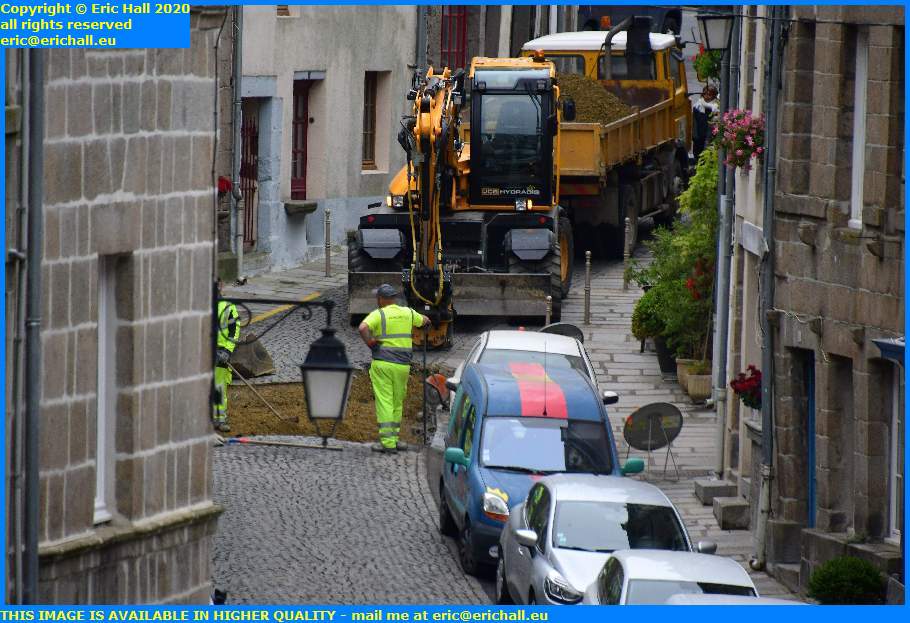 digging up road rue notre dame granville manche normandy france eric hall