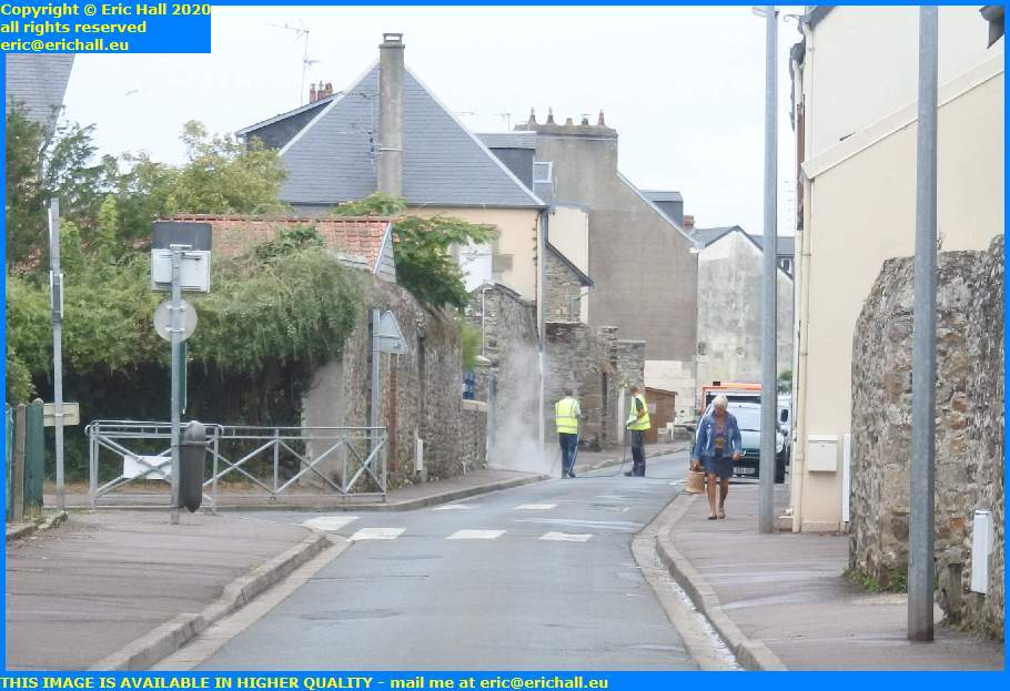 weedkillling with hot water rue de la houle granville manche normandy france eric hall