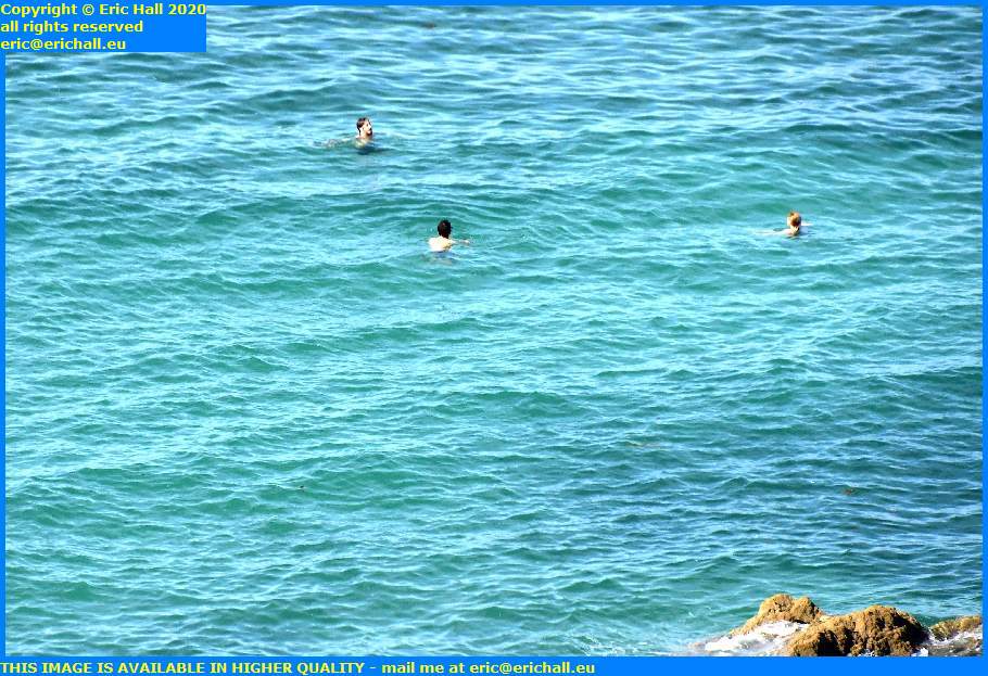 people swimming in sea english channel granville manche normandy france eric hall