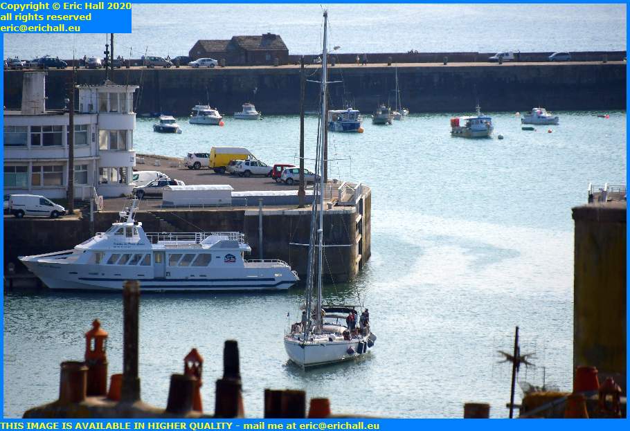 joly france 1 yacht entering port de granville harbour manche normandy france eric hall