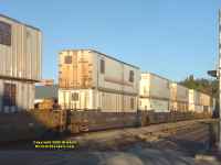 Flagstaff Arizona shipping containers stacked two high on freight car