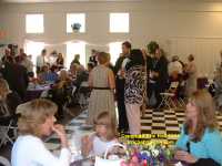 Rhys surrounded by women