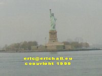 statue of liberty New York seen from the Staten Island ferry copyright free photo royalty free photo