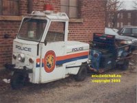 dinky little police three wheel tow truck Nassau County Long Island New York State copyright free photo royalty free photo