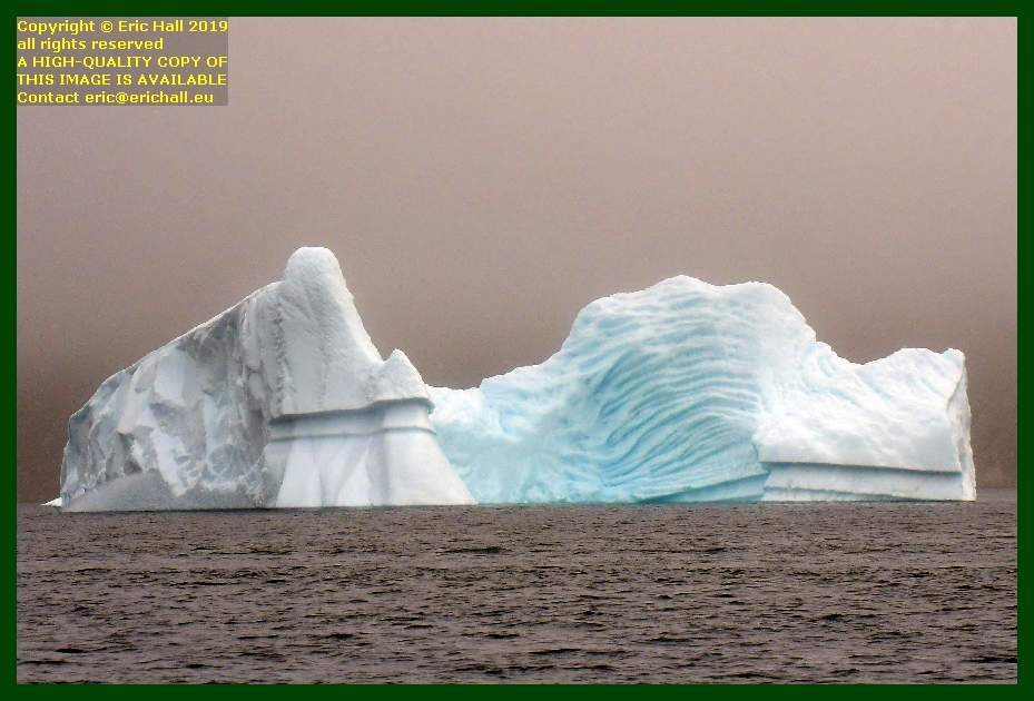 iceberg in the early morning fog Prins Christians Sund greenland Eric Hall