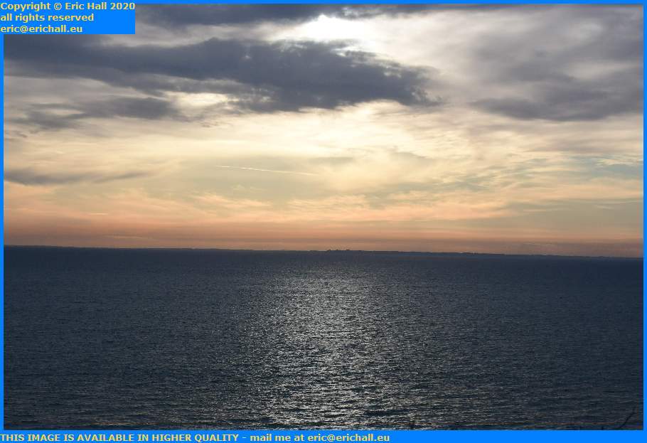 sun reflecting off sea baie de mont st michel brittany coast Granville Manche Normandy France Eric Hall