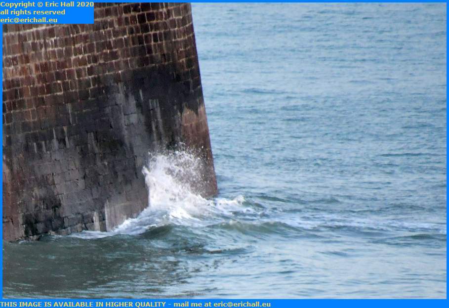 waves on harbour wall Granville Manche Normandy France Eric Hall