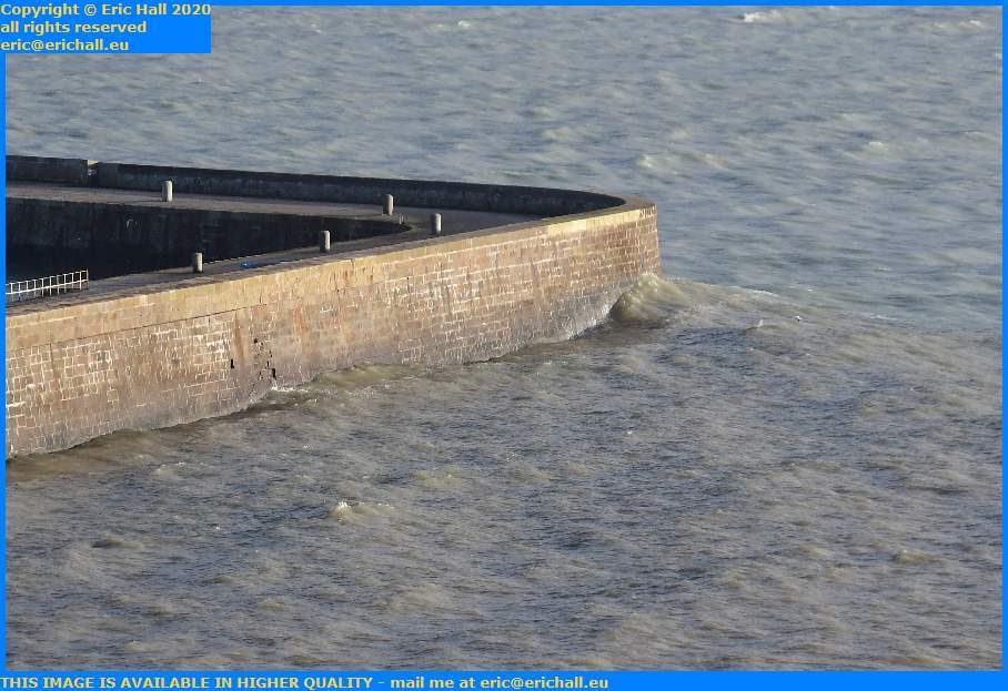 waves harbour wall Granville Manche Normandy France Eric Hall