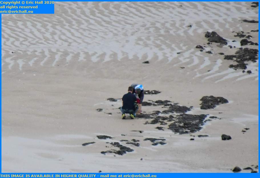 people on beach rue du nord Granville Manche Normandy France Eric Hall