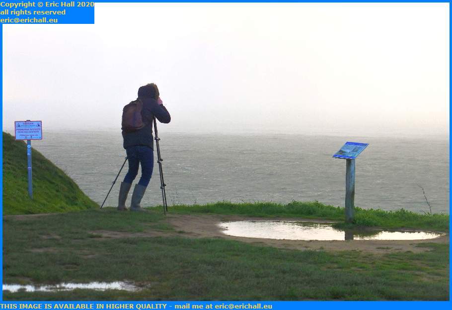 photographer photographing rainstorm Granville Manche Normandy France Eric Hall