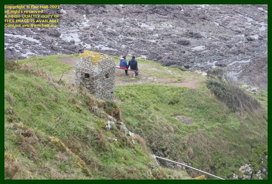 people sitting by cabanon de guet pointe du roc Granville Manche Normandy France Eric Hall