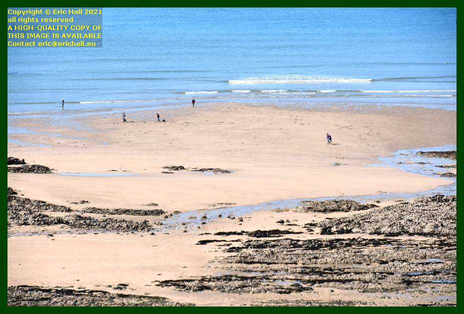 people on beach place d'armes Granville Manche Normandy France photo Eric Hall March 2021