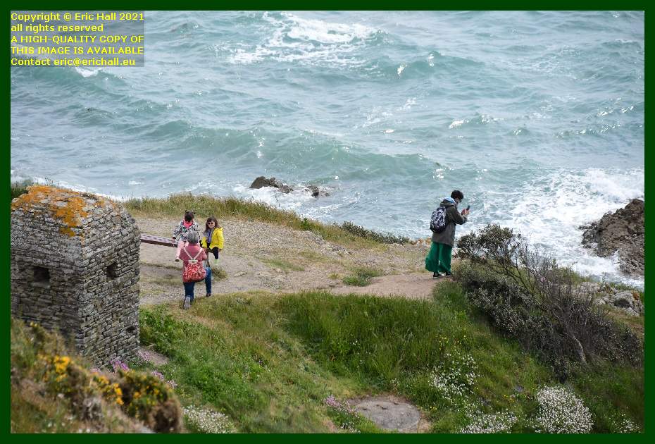 people on bench watchman's cabin pointe du roc Granville Manche Normandy France Eric Hall