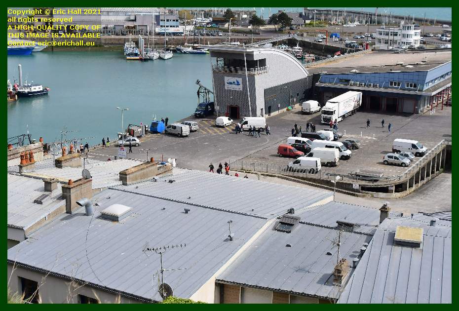 people leaving fish processing plant port de Granville granville Manche Normandy France Eric Hall
