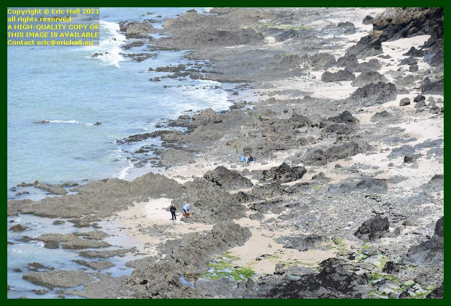 people on beach rue du nord Granville Manche Normandy France Eric Hall