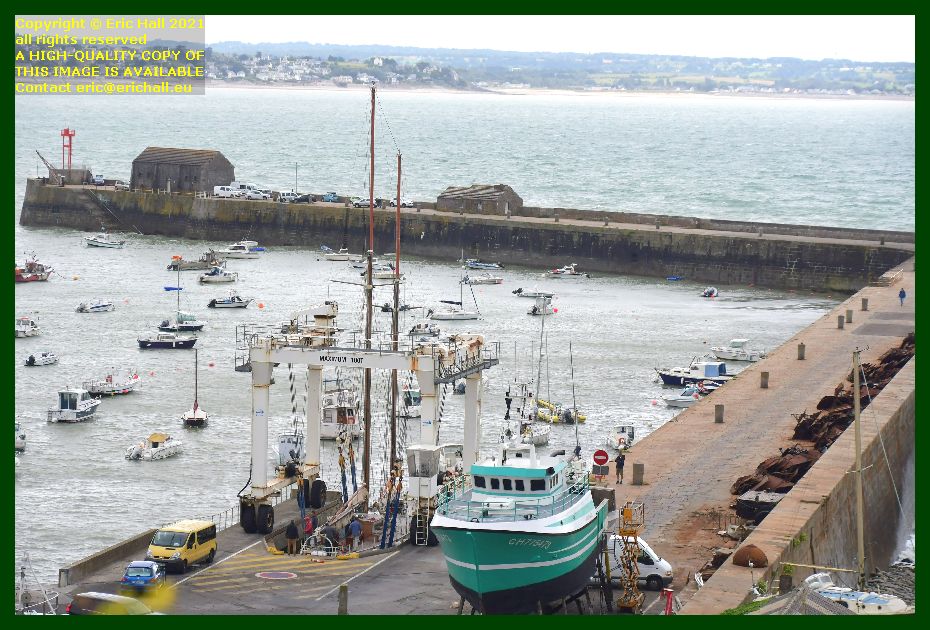 trawler charlevy yacht rebelle going back into the water chantier naval port de Granville harbour Manche Normandy France Eric Hall
