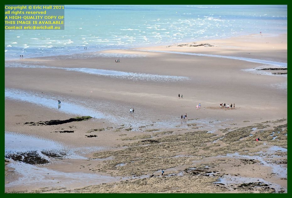 people on beach rue du nord Granville Manche Normandy France Eric Hall