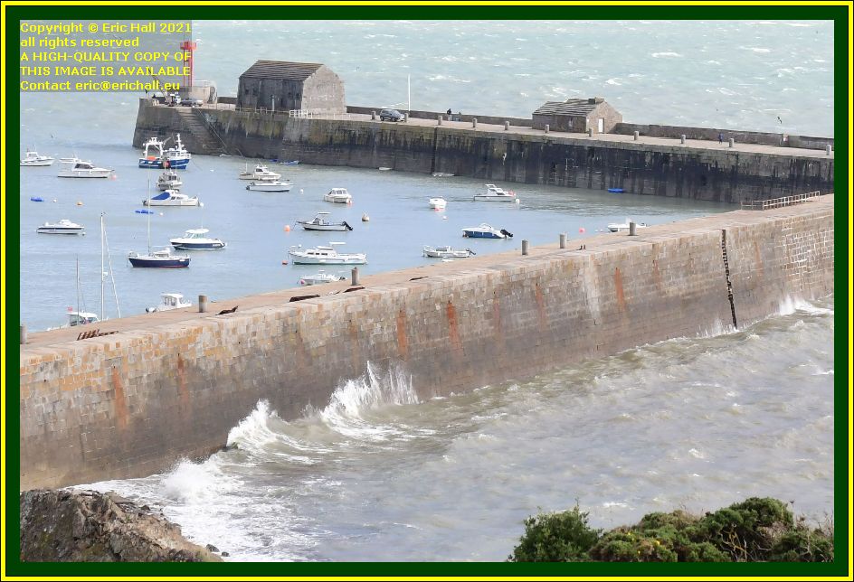 waves breaking on harbour wall port de Granville harbour Manche Normandy France Eric Hall photo October 2021