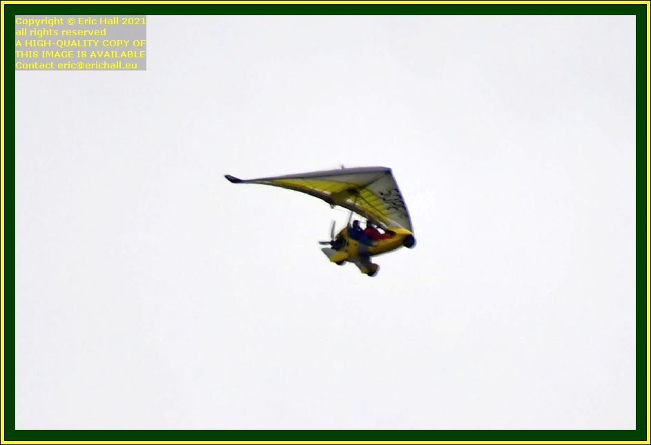 yellow powered hang glider pointe du roc Granville Manche Normandy France Eric Hall photo October 2021