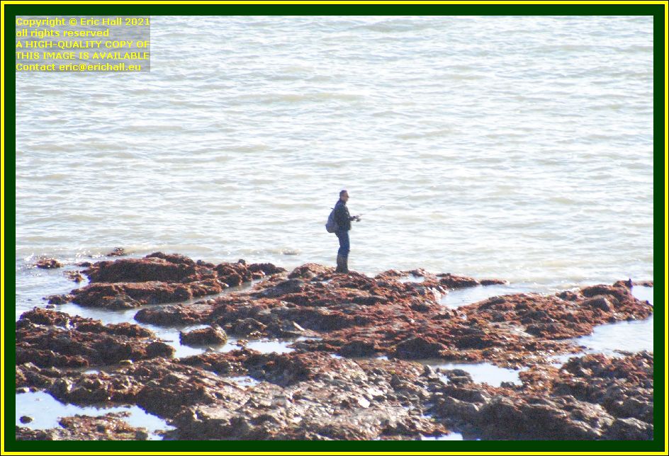 man fishing pointe du roc Granville Manche Normandy France Eric Hall photo October 2021