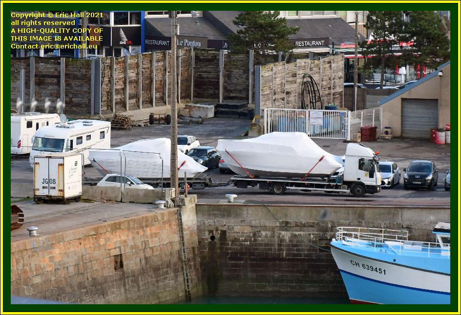 boats being delivered to port de Granville harbour Manche Normandy France photo Eric Hall november 2021