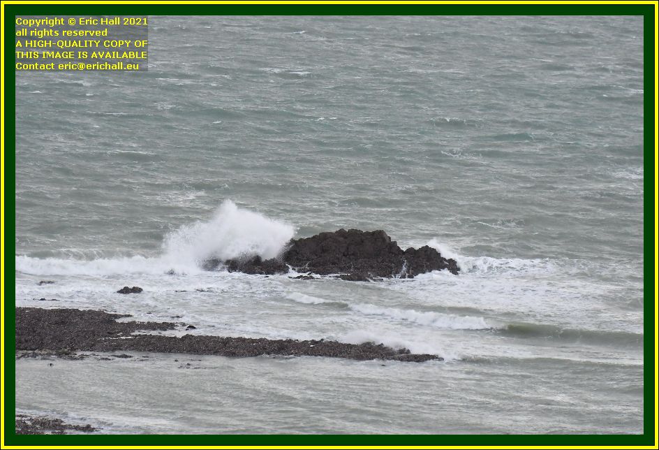 waves breaking on rocks place d'armes Granville Manche Normandy France Eric Hall photo December 2021