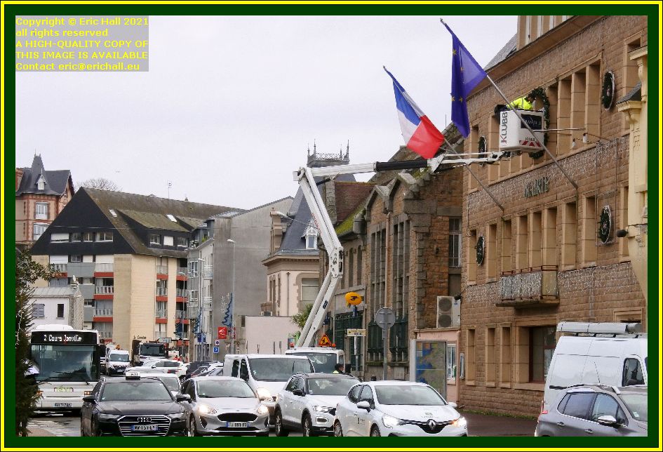 cherry picker fixing wreath to town hall place general de gaulle Granville Manche Normandy France Eric Hall photo December 2021