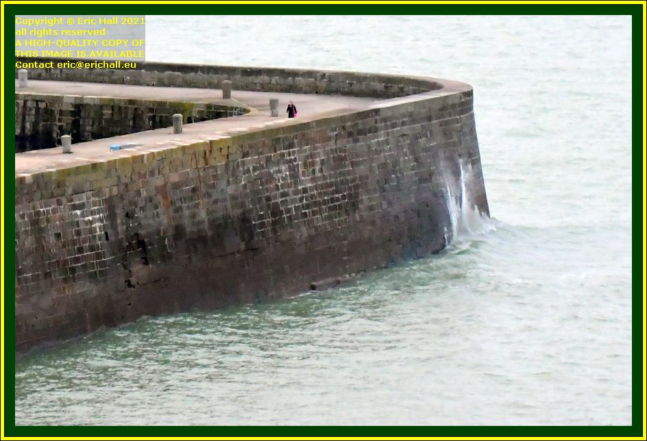 waves on sea wall port de Granville harbour Manche harbour Normandy France Eric Hall photo December 2021