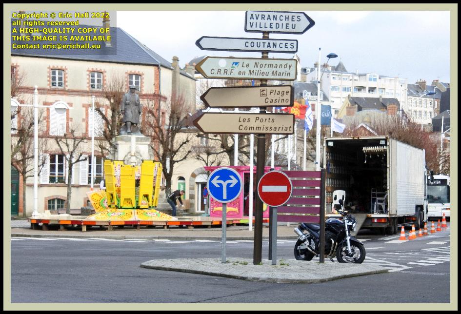 installing kiddies roundabout Place Général de Gaulle Granville Manche Normandy France photo Eric Hall january 2022