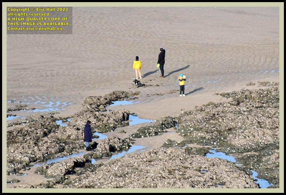 people on beach rue du nord Granville Manche Normandy France photo Eric Hall february 2022