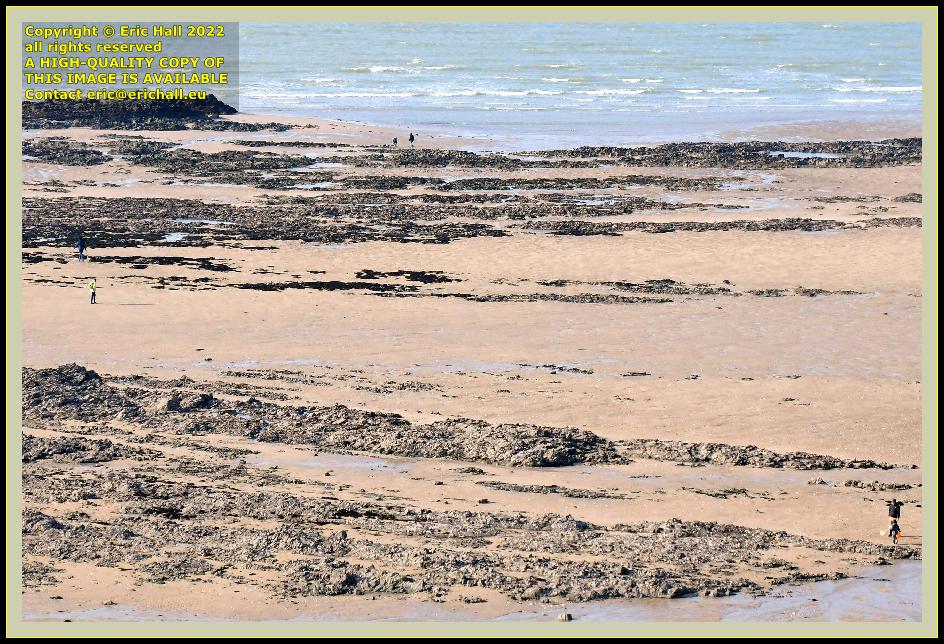 people on beach rue du nord Granville normandy france photo Eric Hall march 2022