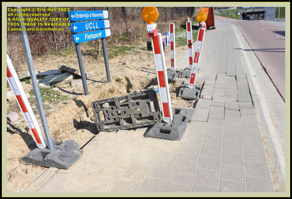 digging up pavement monseigneur van waeyenberghlaan leuven belgium photo Eric Hall march 2022