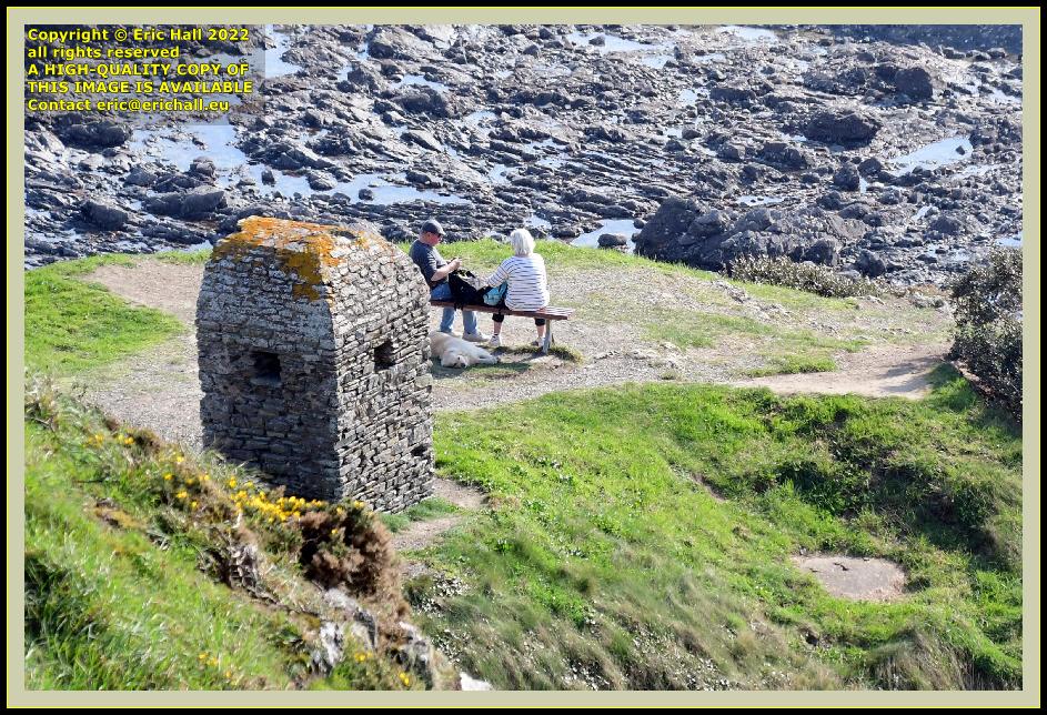 people on bench with dog cabanon vauban pointe du roc Granville Manche Normandy France Eric Hall photo March 2022