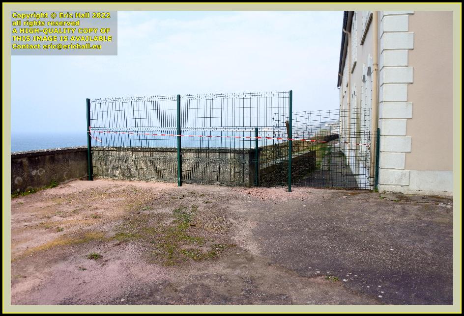 erecting fence foyer des jeunes travailleurs place d'armes Granville Manche Normandy France Eric Hall photo March 2022