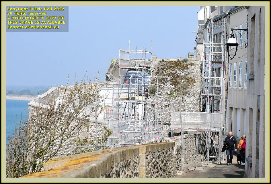 scaffolding repairing medieval city walls rue du nord Granville Manche Normandy France photo Eric Hall april 2022