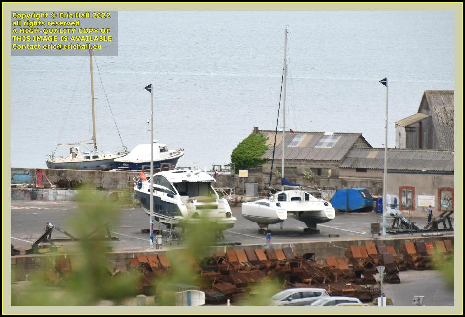 cabin cruiser catamaran chantier naval port de Granville harbour Manche Normandy France Eric Hall photo June 2022